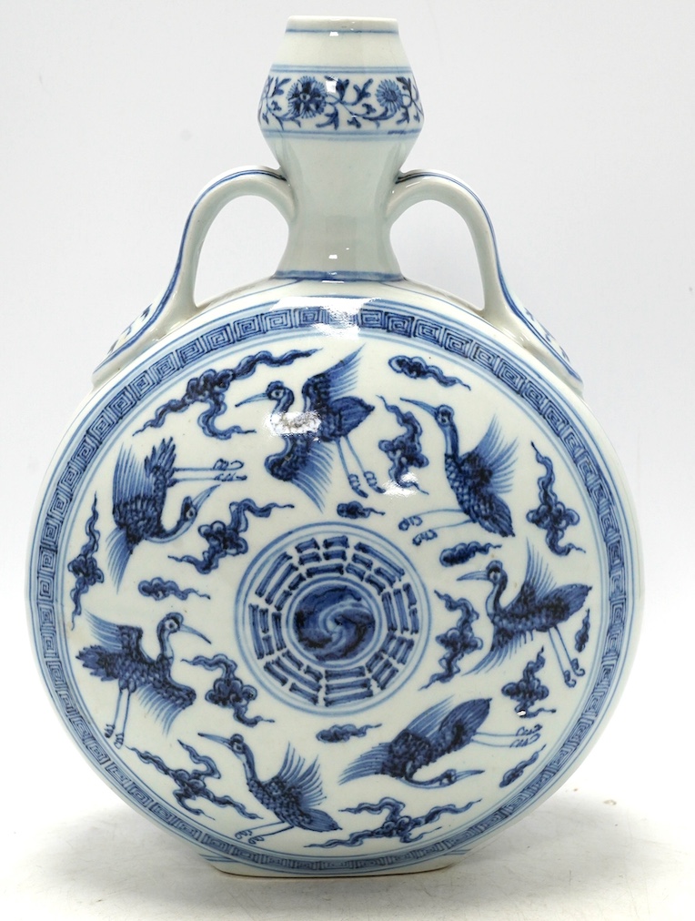 A Chinese blue and white two-handled moonflask, 30cm high. Condition - good